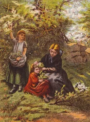 Woman dressing a girl