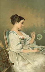 Young woman blowing bubbles