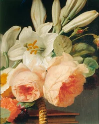 Bouquet of lilies and roses in a basket