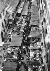 The picturesque market in Passage Berryer, Paris, 1931