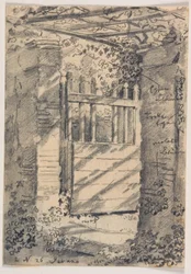 An open garden gate overshadowed by vine leaves
