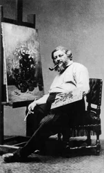 Gustave Courbet in his workshop studio, c. 1876, photo by Etienne Carjat