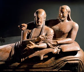 Etruscan Art: Sarcophagus of the Spouses, Terracotta Sculpted Group of a Couple on the Funeral Bed (Detail) from Cerveteri, Italy. 525-500 BC. Paris, Louvre Museum
