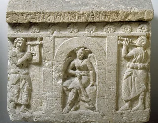 Etruscan Art: The Lasa, Genie of Death at the Entrance of Hell. Low Relief of an Urn of Chiusi. 3rd or 2nd Century BC. Palermo, Museo Archeologico Nazionale