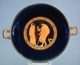 Attic red-figure cup decorated with a man giving a boy a cockerel, c. 470 BC