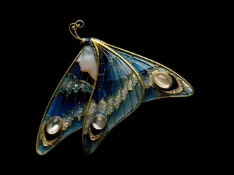 Art Nouveau: gold brooch, translucent enamel, opal, moonstone and diamond in the shape of a butterfly woman