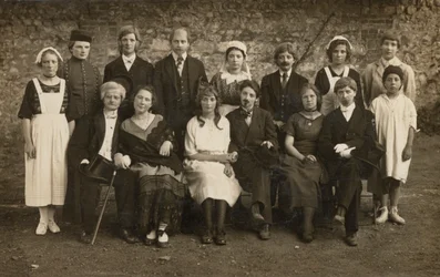 Group portrait of young people in costume