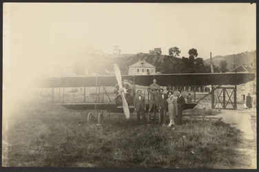 Group Portrait in Front of Airplane