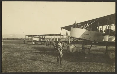 Man in Front of Airplane