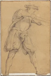 Man Taking Aim with a Gun