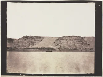 General View of Monuments Carved into Bedrock with Photographers Dahabieh. Abu Simbel