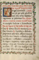 Initial T: A Priest Celebrating Mass