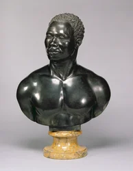 Bust of a man (black limestone and yellow marble)