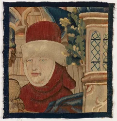 Small fragment of tapestry depicting the head of a man