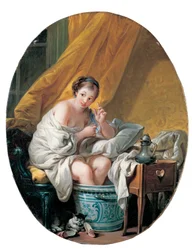 A young woman taking a footbath