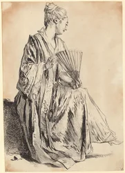 Young Seated Woman Playing with a Fan