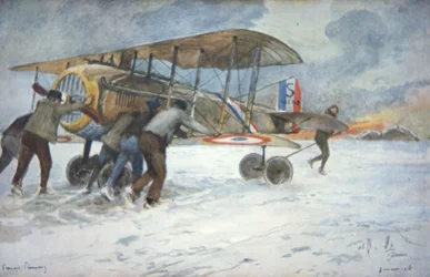 Ground crew and pilot manhandle a French SPAD fighter through the snow to a hangar, January 1918