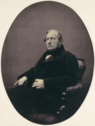 Man Seated in Armchair