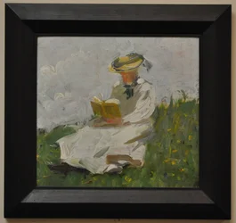 Reading woman in the green