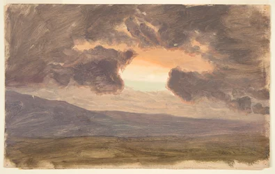 Sunset over bare hills