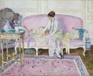 Woman Seated on Sofa in Interior