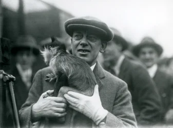A Black-Crested Mangabey, Possibly Freckles, with His Handler, Taking Part in an Outside Broadcast from London Zoo, 1925