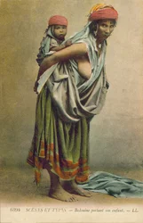 Algeria: Bedouin Carrying Her Child