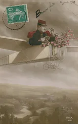 Postcard of an aviator delivering flowers, sent on 6th June 1913