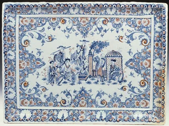 A Rouen rectangular tray, painted in blue and iron-red