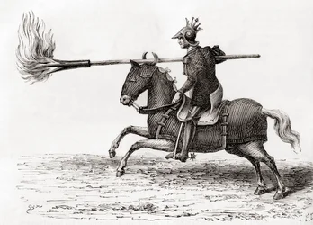 A medieval knight carrying a fire lance, or fire spear, one of the first gunpowder weapons in the world, from Les Merveilles de la Science, published c.1870