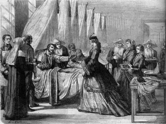 Austro-Prussian War (1866): Empress Elizabeth of Austria (Sissi) (1837-1898) visits wounded soldiers in Vienna. Engraving in "Le Monde Illustre" No. 486 of August 4