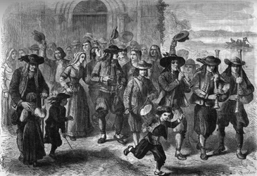 Breton custom: couple of young marriages at the exit of the church. At the top of the procession are players of biniou and drum. Treguennec, Finistere