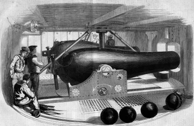 Canon inside the tower occupying the middle of the armored 