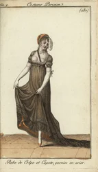 Fashionable woman in nipple-revealing crepe dress