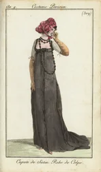 Fashionable woman in satin bonnet and crepe dress