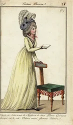 Fashionable woman with chair