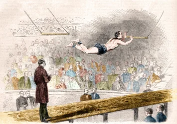 Flying trapeze number by French acrobat Jules Leotard (1839-1870) at Cirque de Napoleon (today, Cirque d