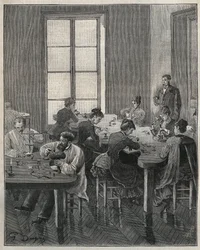 Jewelry workshop in Paris in the 19th century. Engraving from 1885 in Les arts et metiers illustres by Adolphe Bitard.