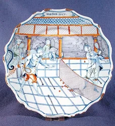 Plate painted with a scene of tennis