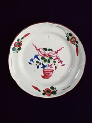 Plate with Decoration of a Bouquet Topped with a Phrygian Cap