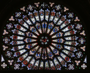 Rose window depicting Christ surrounded by the twelve Apostles and Evangelist symbols