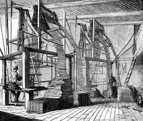 Silkworkers in a workshop in Lyon using a Jacquard loom