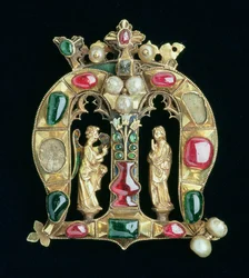 The Hylle Jewel, in the form of a crowned Lombardic initial M with annunciation figures, late 14th century