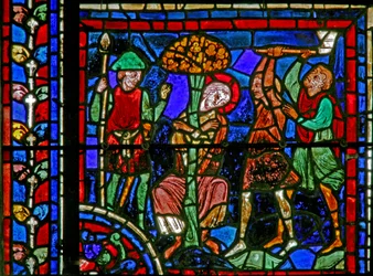 The St Martin window: the saint is tied to a tree by two brigands