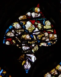 The west rose window depicting a scene from the Book of Revelation: Twenty four elders together with the angel of St Matthew and the lion of St Mark