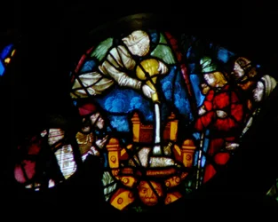 The West Rose Window Depicting a Scene from the Book of Revelation: Fifth Vial is Poured Upon the Seat of the Beast, His Subjects Gnawing Their Tongues for Pain