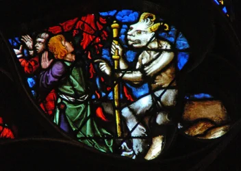 The west rose window depicting a scene from the Book of Revelation: Lamb on Mount Sion with two of the 144,000, redeemed