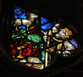 The west rose window depicting a scene from the Book of Revelation: Lamb on Mount Sion with two of the 144,000, redeemed