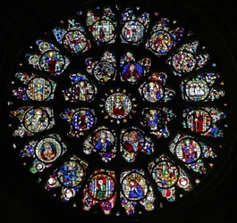 The west rose window with fragmentary fifteenth and sixteenth panels mostly depicting saints