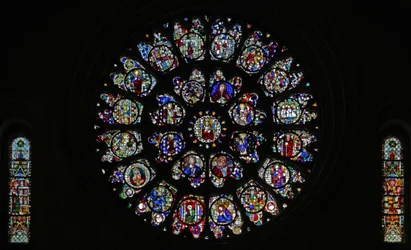 The west rose window with fragmentary fifteenth and sixteenth panels mostly depicting saints (rose window - internal)